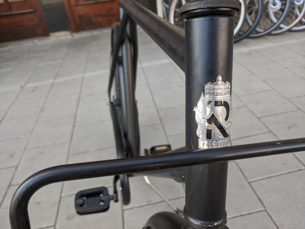 Black bike with silver sticker